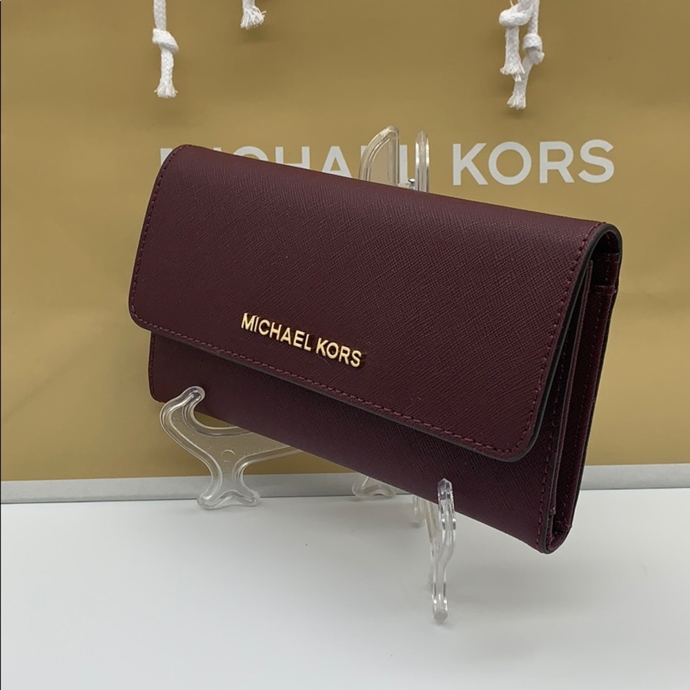 MICHAEL KORS JET SET TRAVEL LG TRIFOLD MERLOT